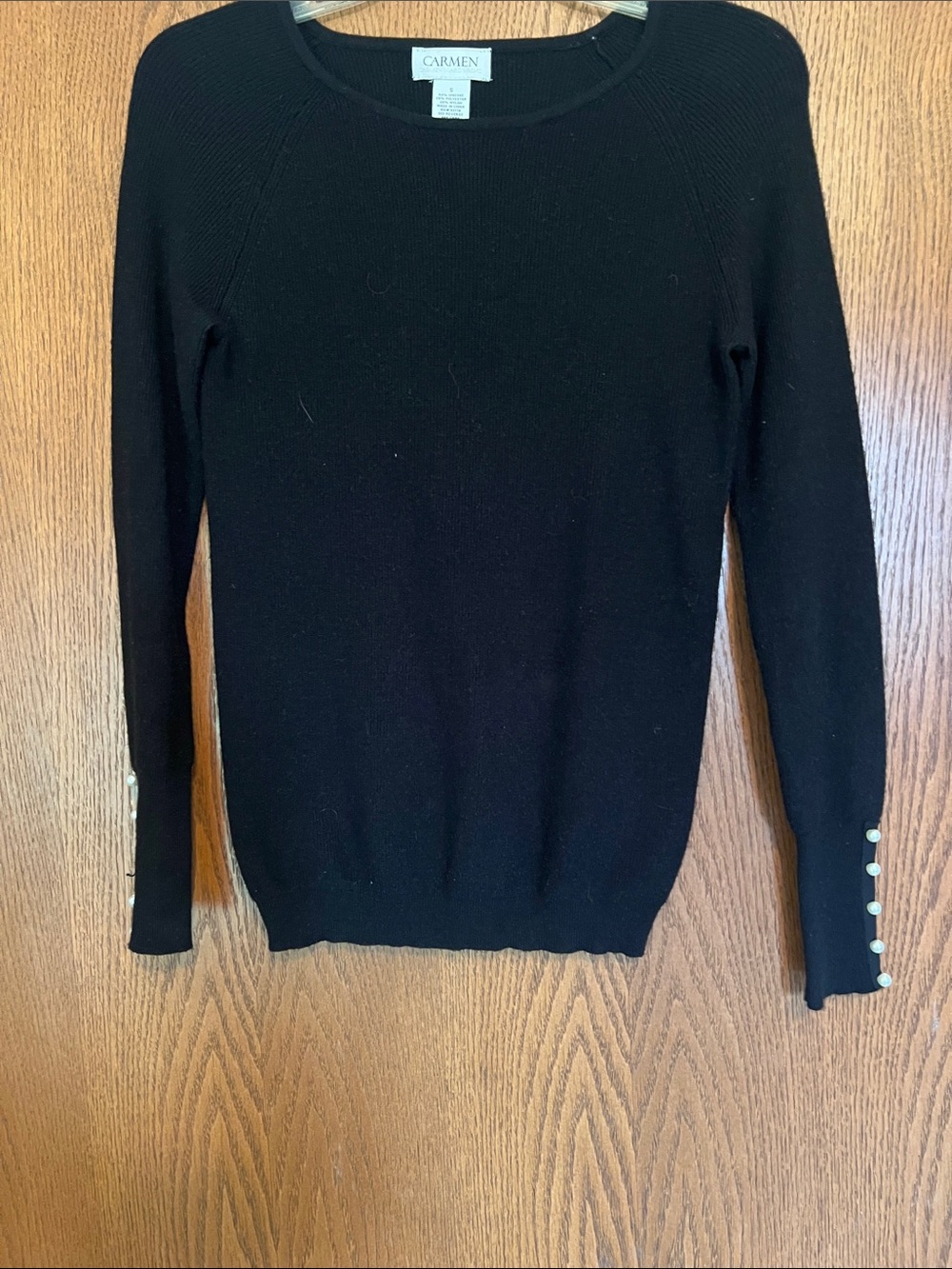 Carmen Black Crewneck Sweater with Pearl Sleeve Buttons